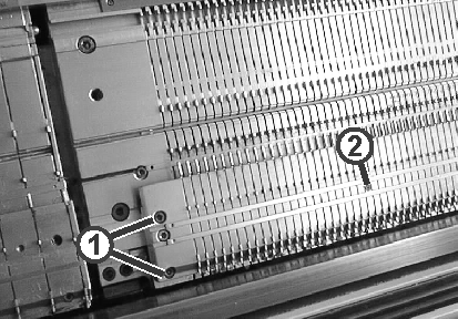 Soltar la fontura de la platina de selección